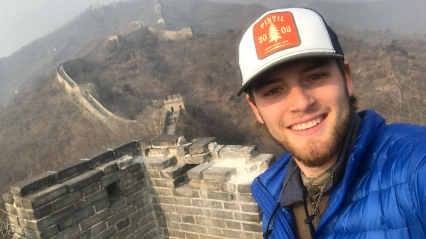 a student at the Great Wall of China