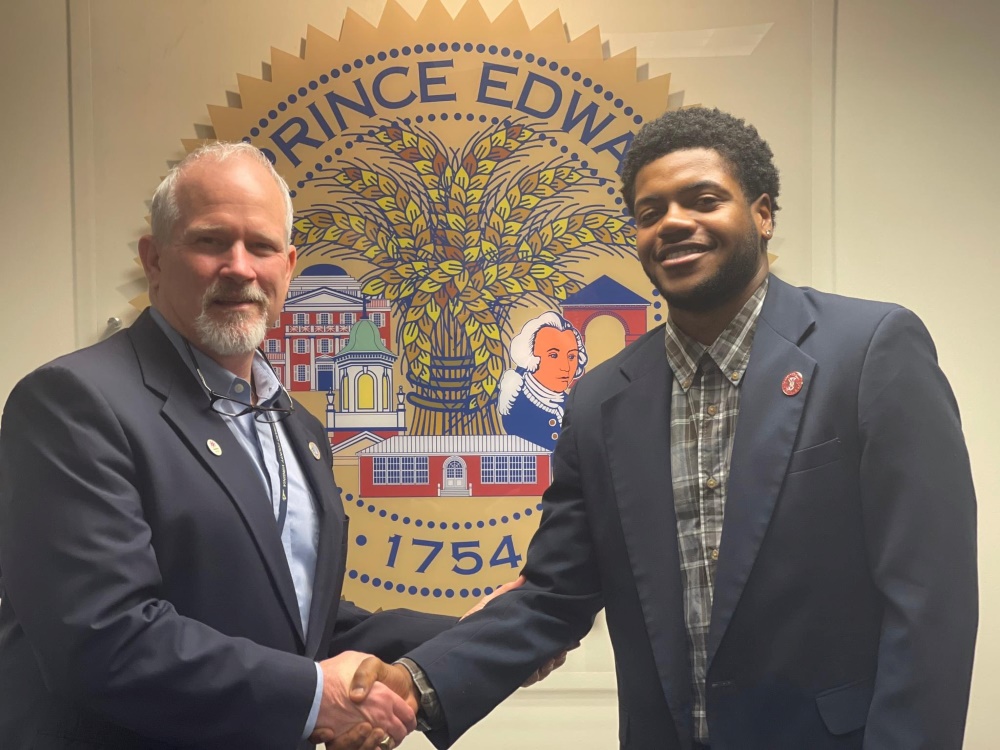 Tramell Thompson &rsquo;24 with Prince Edward County Administrator Doug Stanley
