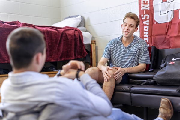 students hanging out in their dormroom