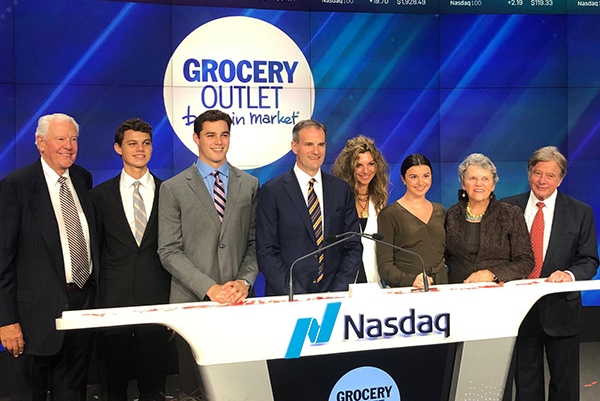 Eric Lindberg and family standing on the floor of the NYStock Exchange