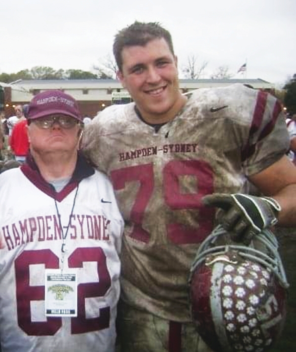 Scott Anderson in football uniform with Shorty Simms