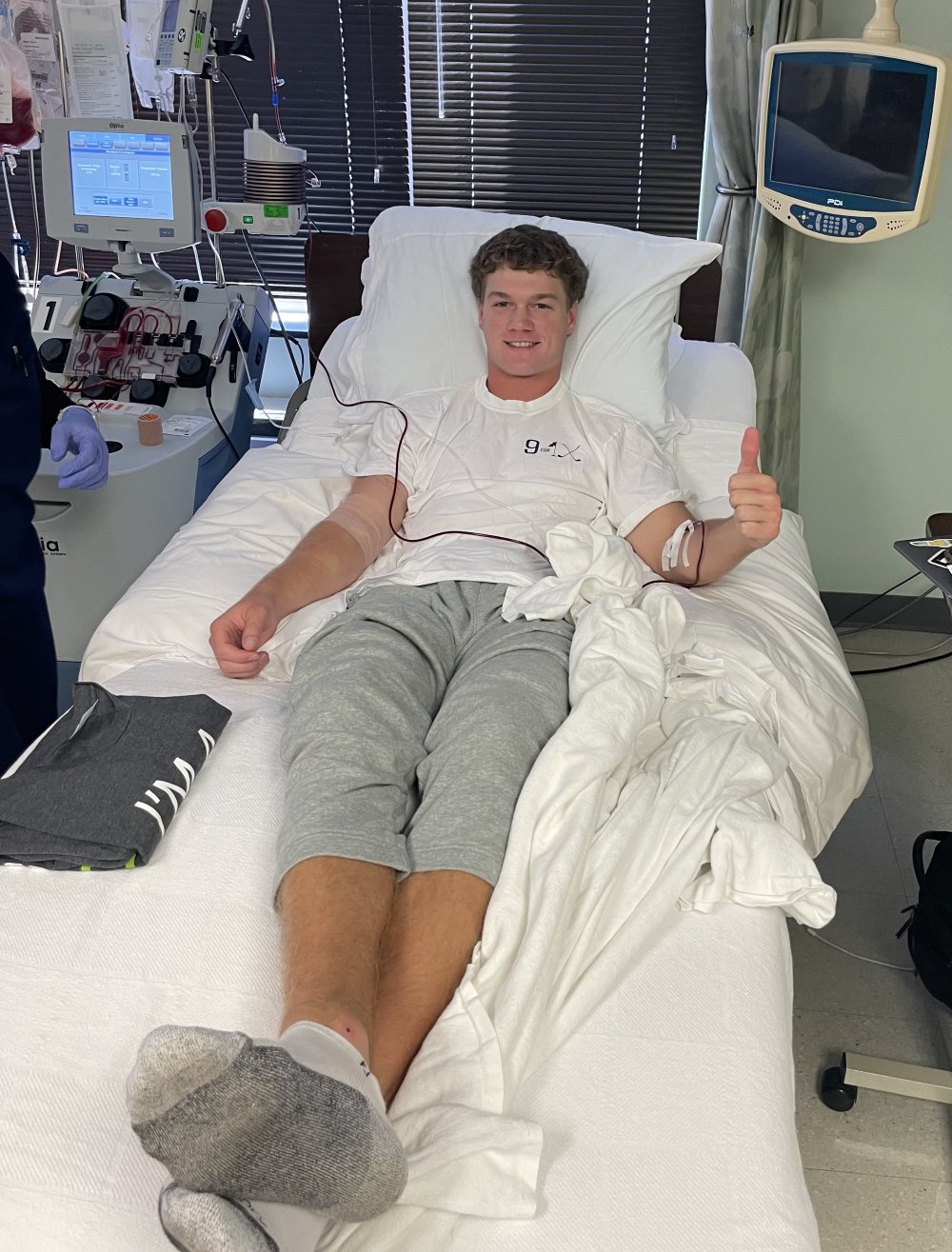 Peyton Lambert &rsquo;27 laying in a hospital bed