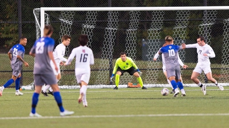 Wills Huddleston playing soccer on the field 
